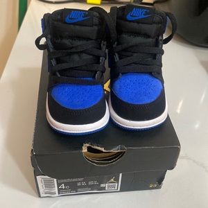 Black and blue Jordan 1s
